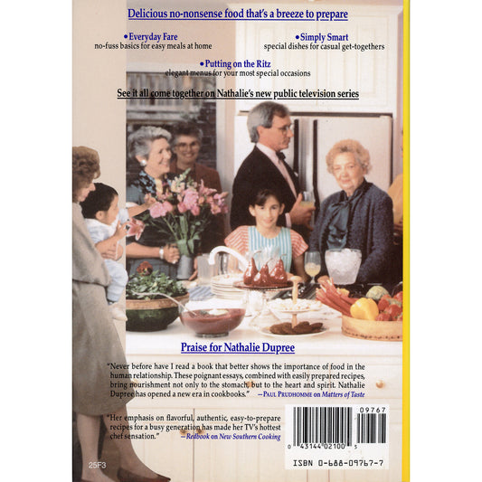 Back cover of a book titled 'Nathalie Dupree Cooks for Family and Friends' featuring a family dinner photograph, endorsements, a barcode, and ISBN 0-684-07177-7