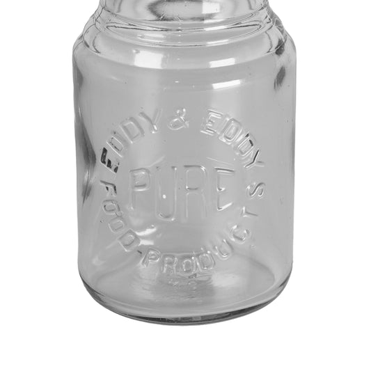 Early 1907–1912 Eddy & Eddy embossed Pure Food Products jar. St. Louis pantry glass with wide mouth and stepped neck. Charming antique display piece.