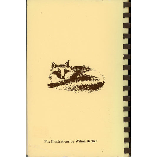 A vintage spiral-bound cookbook cover back for Foxcahse Cookbook featuring a black sketch of a sleeping fox and the text 'Fox Illustrations by Wilma Becker' at the bottom. The notebook is bound with a dark spiral on the right side.