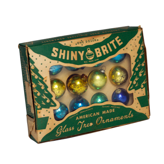 Vintage 1950s Shiny Brite miniature glass ornaments. Box of 12 American-made 1-inch blue and gold Christmas ornaments.