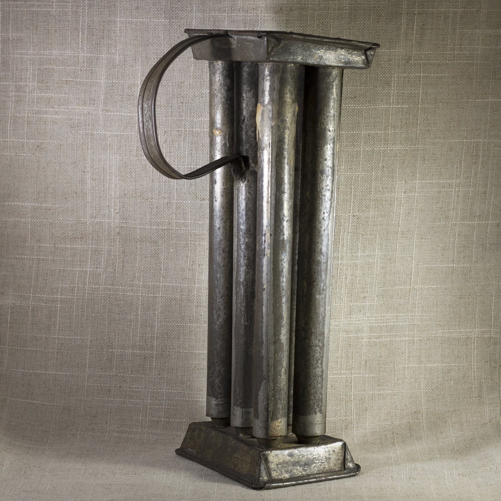 PRIMITIVE TIN SIX-CANDLE MOLD