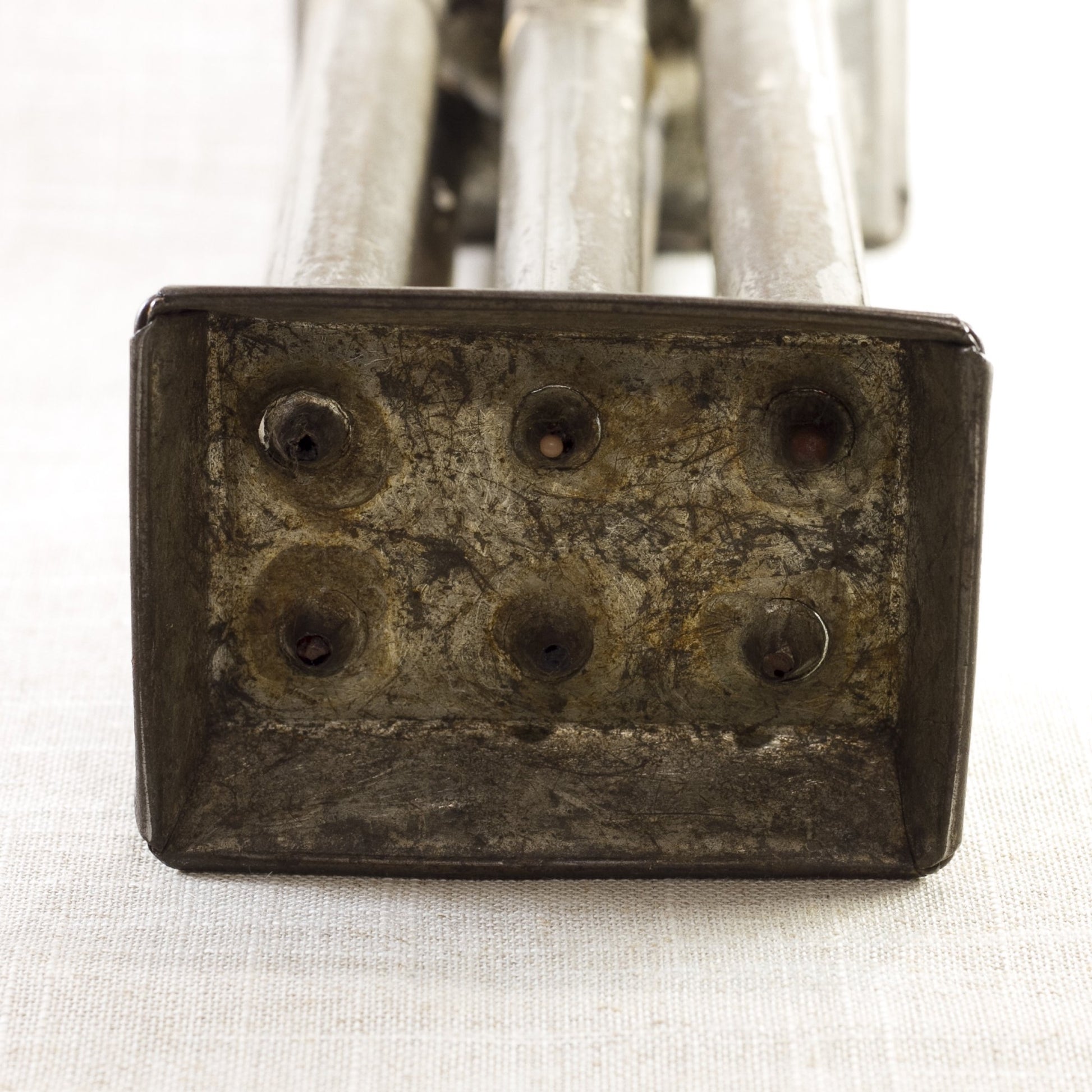 PRIMITIVE TIN SIX-CANDLE MOLD