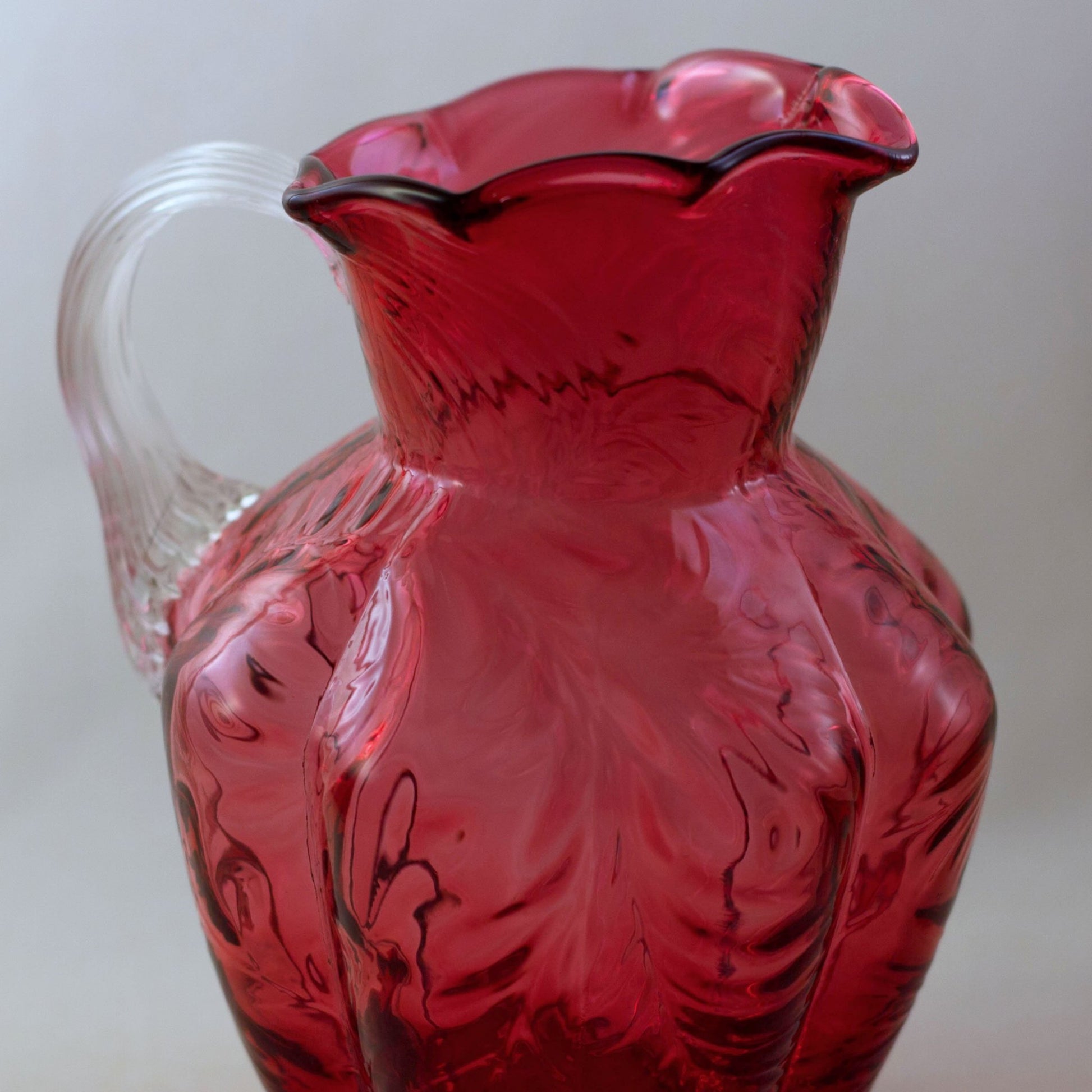FENTON CRANBERRY GLASS Pitcher with Embossed Fern Design and Reed Design Handle