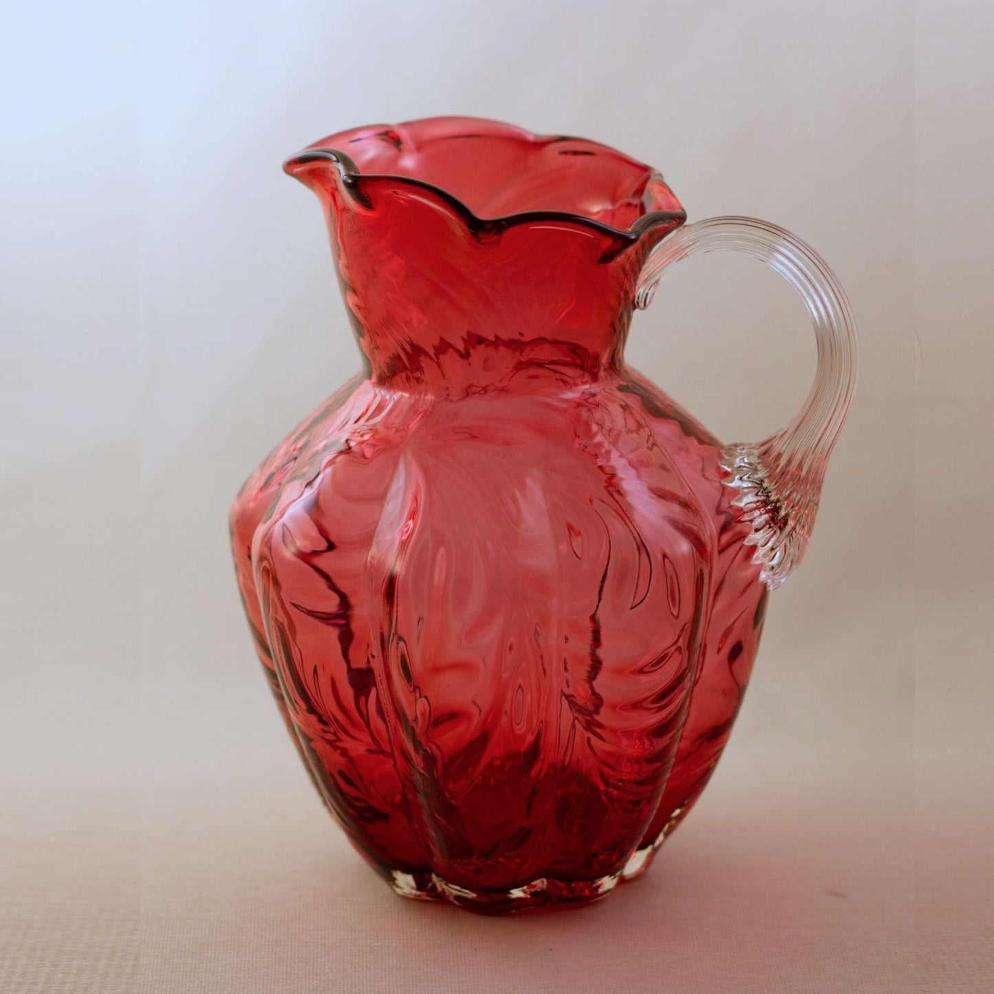 FENTON CRANBERRY GLASS Pitcher with Embossed Fern Design and Reed Design Handle