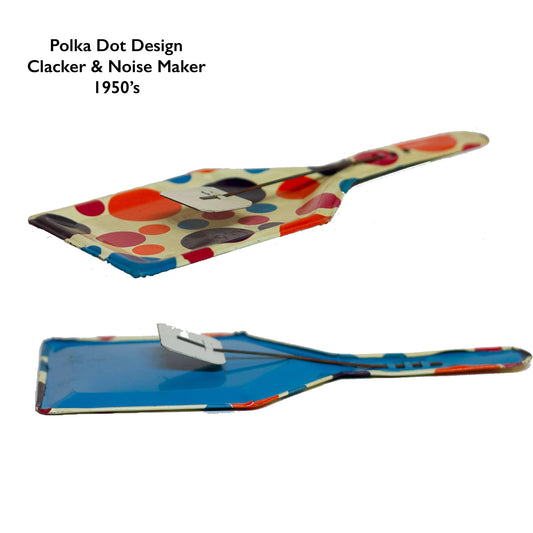 TIN-LITHOGRAPH POLKA DOT CLACKER 1950s NOISEMAKER. The lithograph on the shovel shaped noisemaker is filled with red, orange, purple, and blue polka dots. Appears to be a style that was part of a Party Time set made by the U.S. Metal Toy Manufacturing Company of Brooklyn, New York, but the lithograph is not marked.