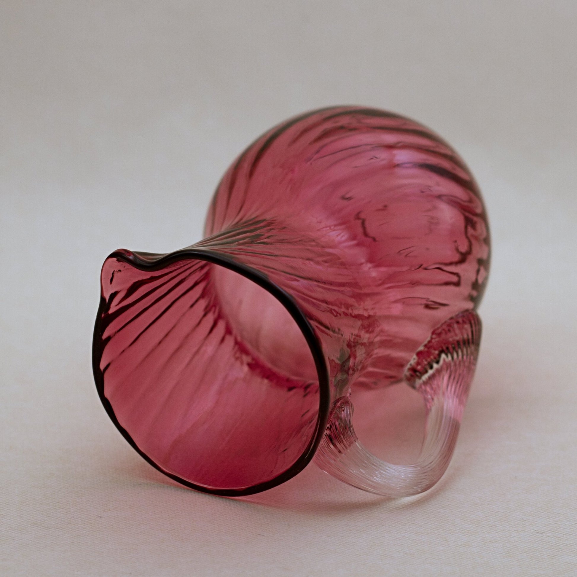 PILGRIM CRANBERRY GLASS Jug or Pitcher with Optic Swirl and Applied Clear Handle