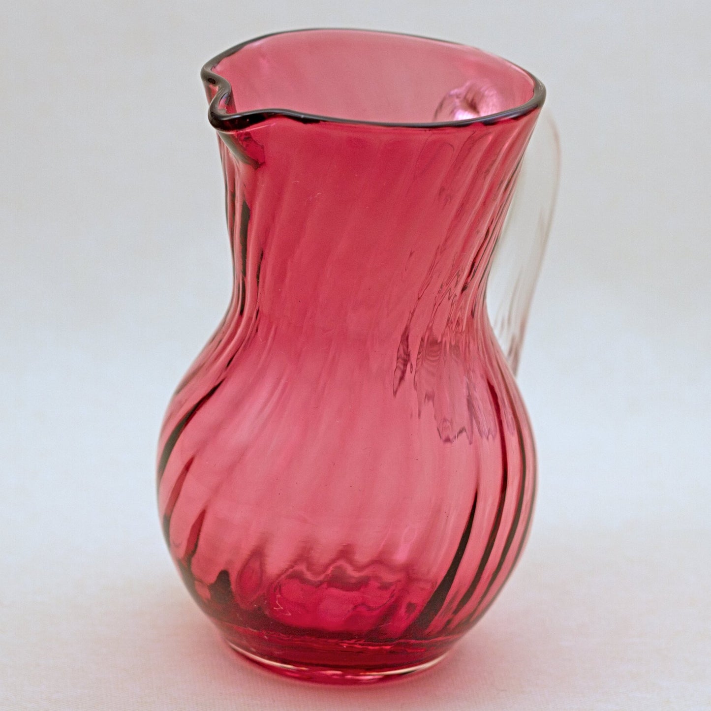 PILGRIM CRANBERRY GLASS Jug or Pitcher with Optic Swirl and Applied Clear Handle