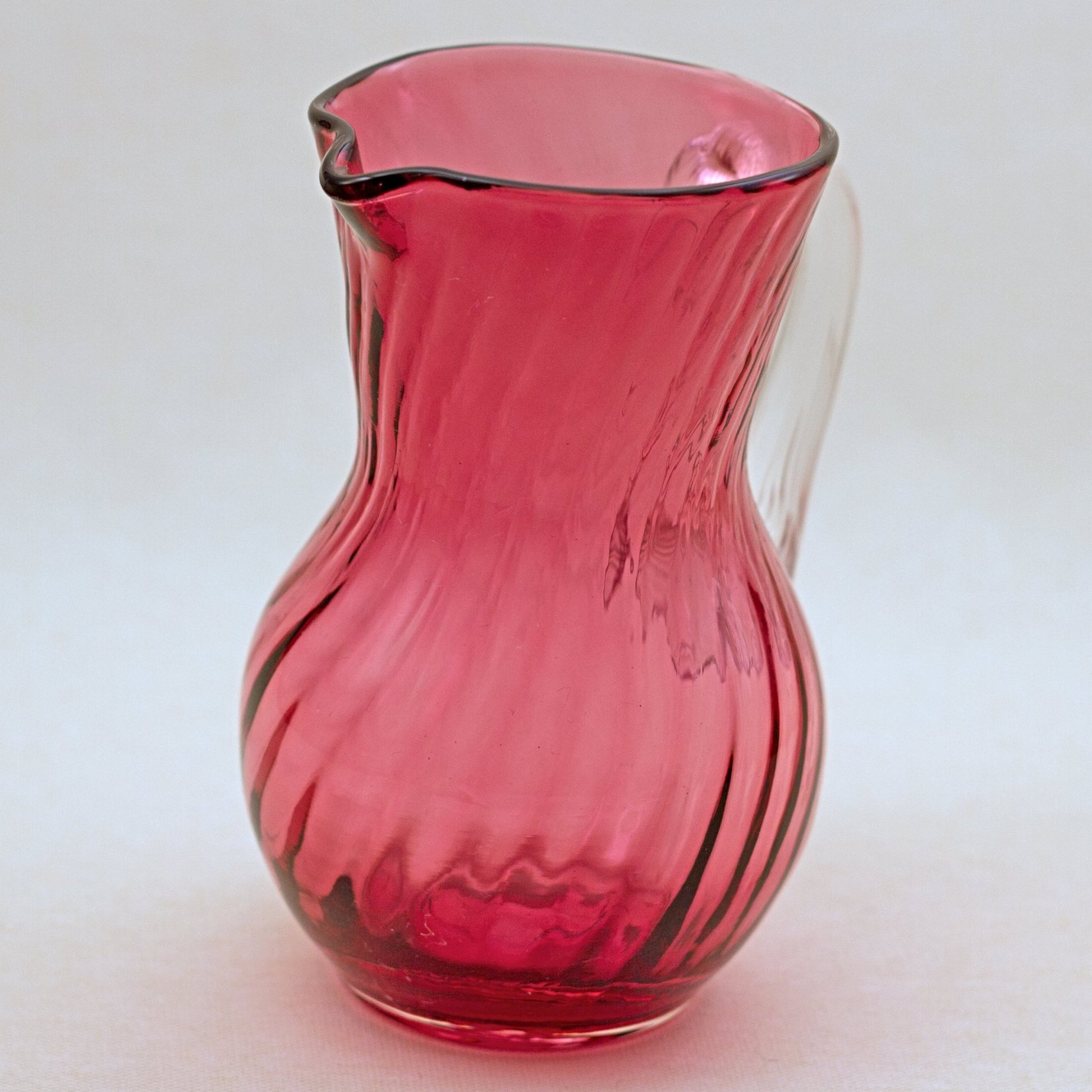 PILGRIM CRANBERRY GLASS Jug or Pitcher with Optic Swirl and Applied Clear Handle
