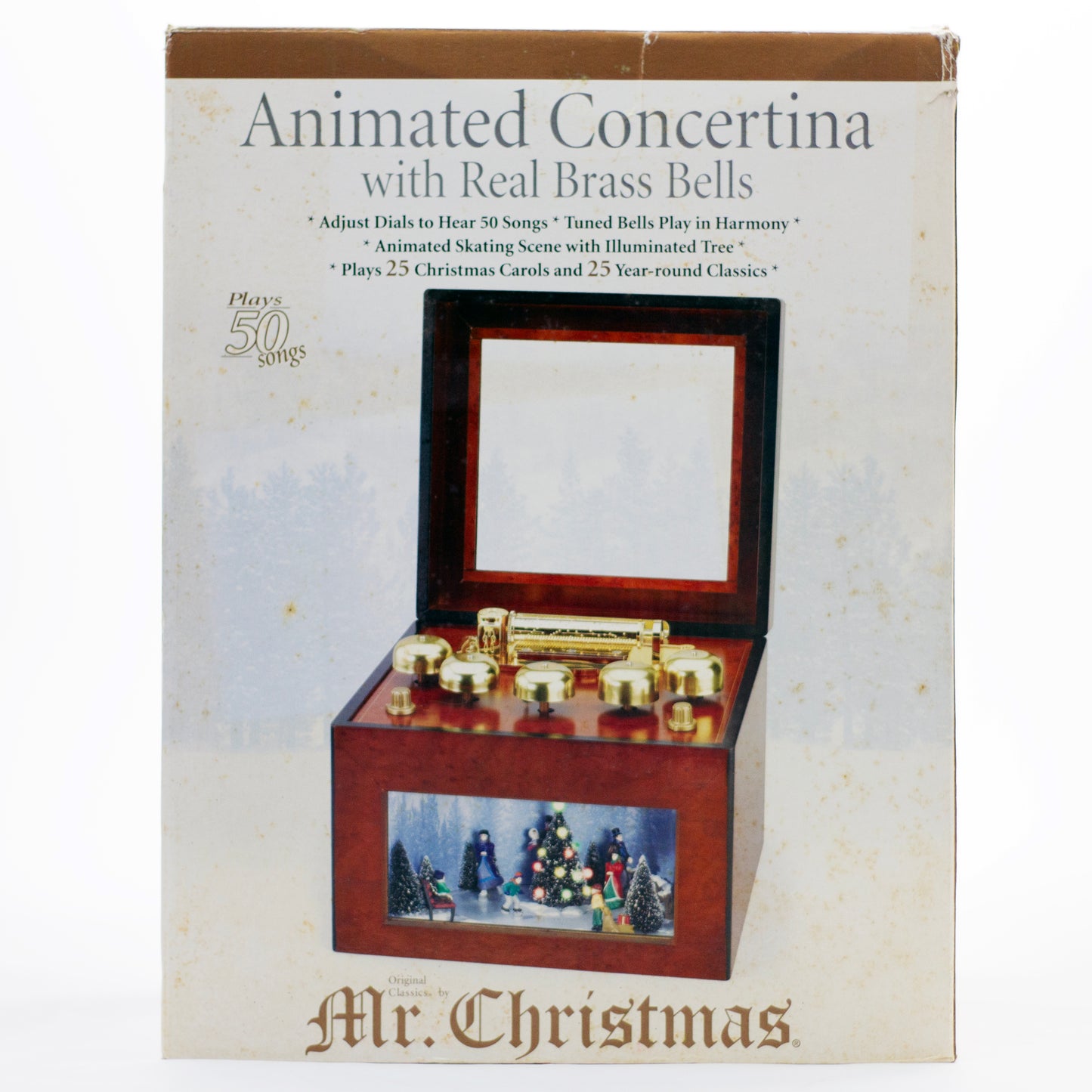 2006 Mr. Christmas Gold Label Animated Concertina with 50 songs, five real brass bells, animated skating scene, box, adapter and manual.