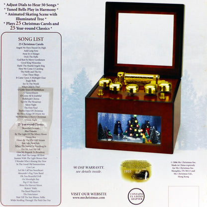 2006 Mr. Christmas Gold Label Animated Concertina with 50 songs, five real brass bells, animated skating scene, box, adapter and manual.