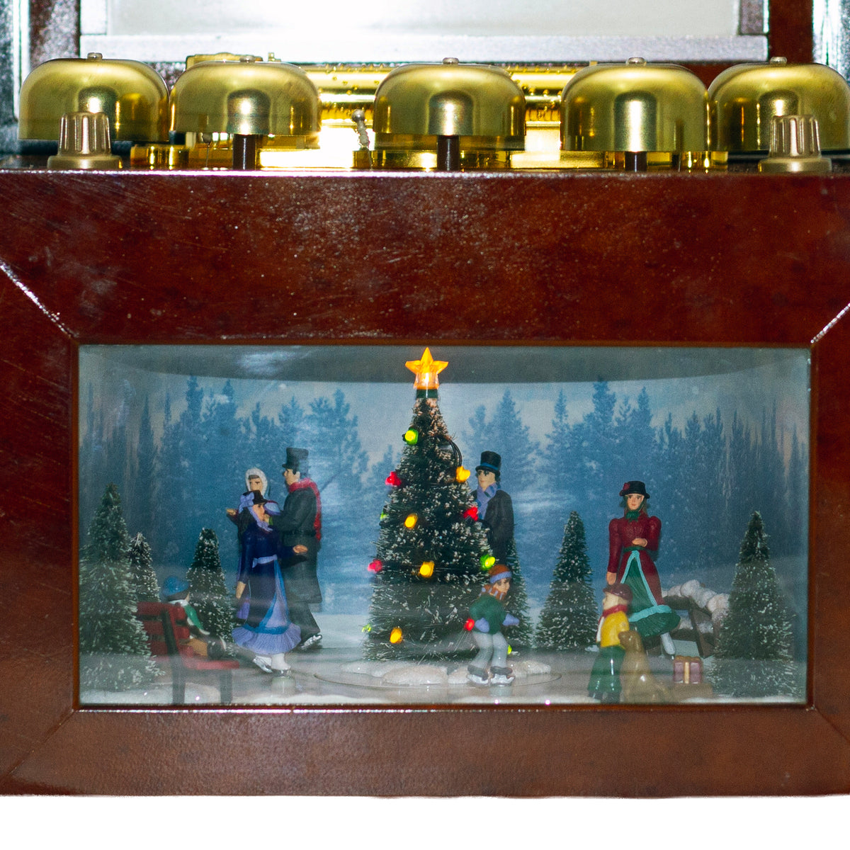 2006 Mr. Christmas Gold Label Animated Concertina with 50 songs, five real brass bells, animated skating scene, box, adapter and manual.