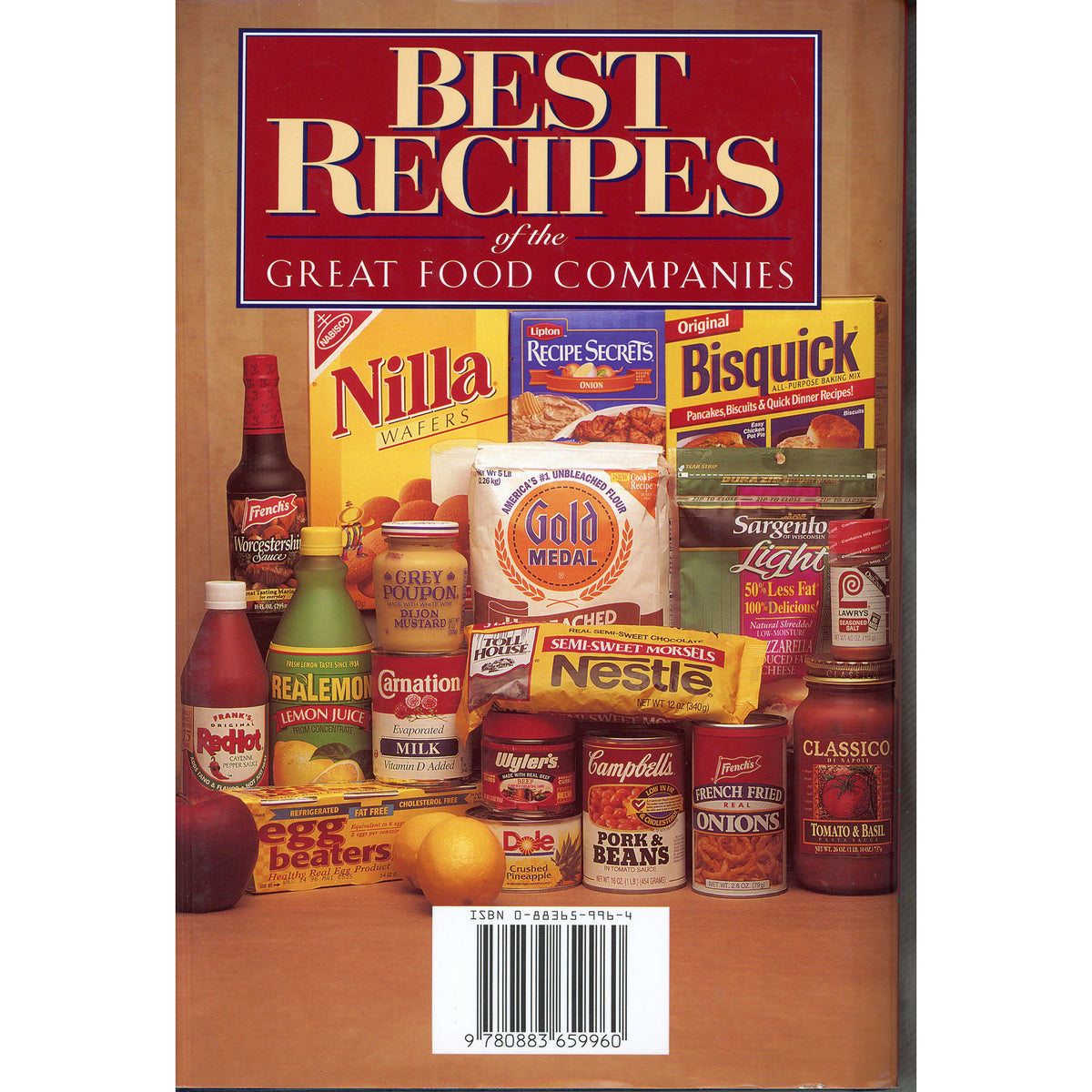 Back cover of a vintage cookbook  titled "Best Recipes of the Great Food Companies," featuring a collage of assorted branded packaged foods and beverages on a wooden surface.