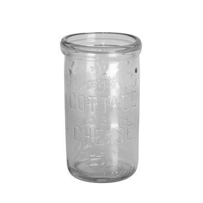 1948 Clover Blossom cottage cheese jar in clear Duraglas, made by Owens-Illinois. Embossed floral design, 12 oz net, no lid.