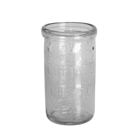 1948 Clover Blossom cottage cheese jar in clear Duraglas, made by Owens-Illinois. Embossed floral design, 12 oz net, no lid.