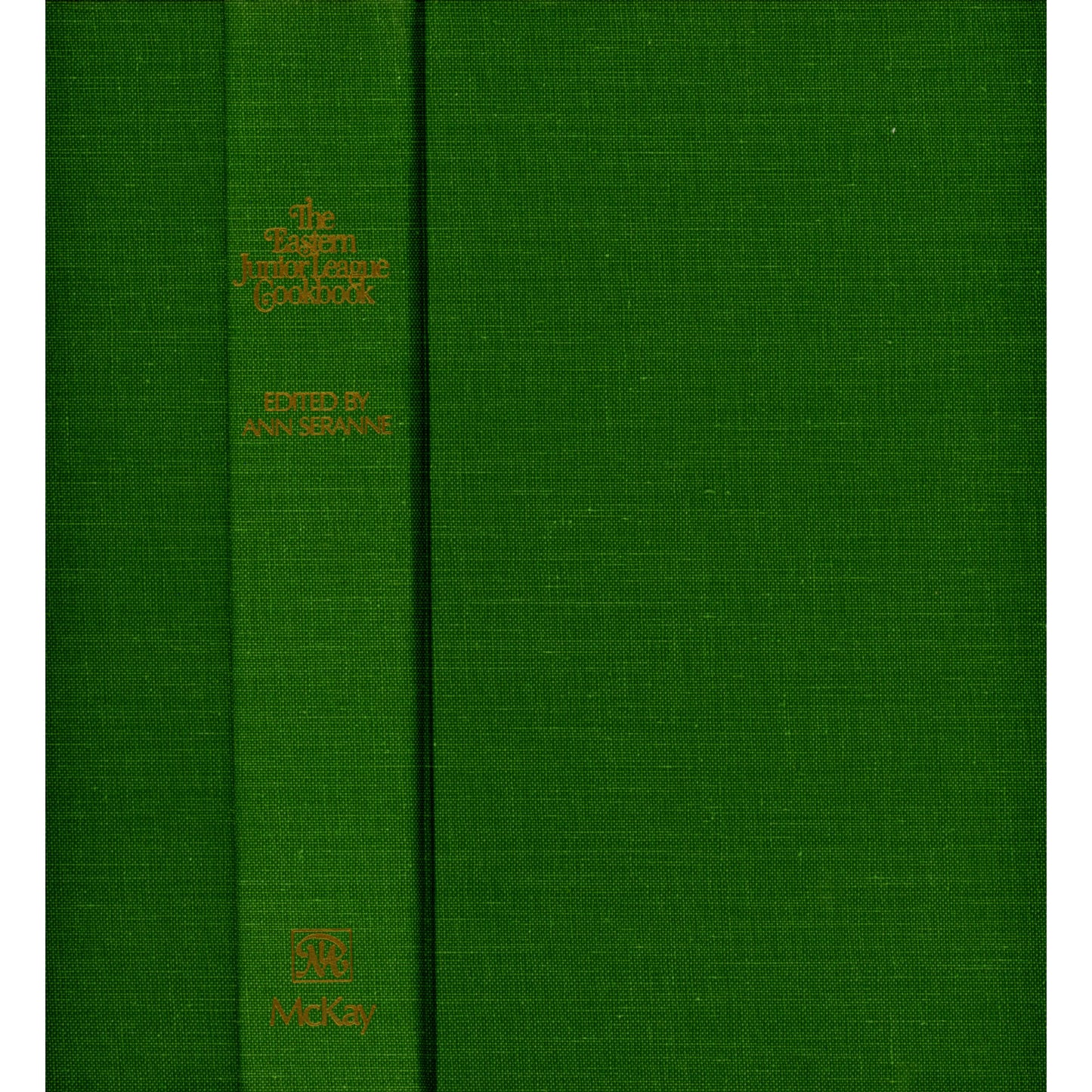 1980 first‑edition Eastern Junior League Cookbook with 460+ regional recipes. Hardcover with dust jacket. Ann Seranne editor. Spine