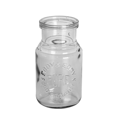 Early 1907–1912 Eddy & Eddy embossed Pure Food Products jar. St. Louis pantry glass with wide mouth and stepped neck. Charming antique display piece.