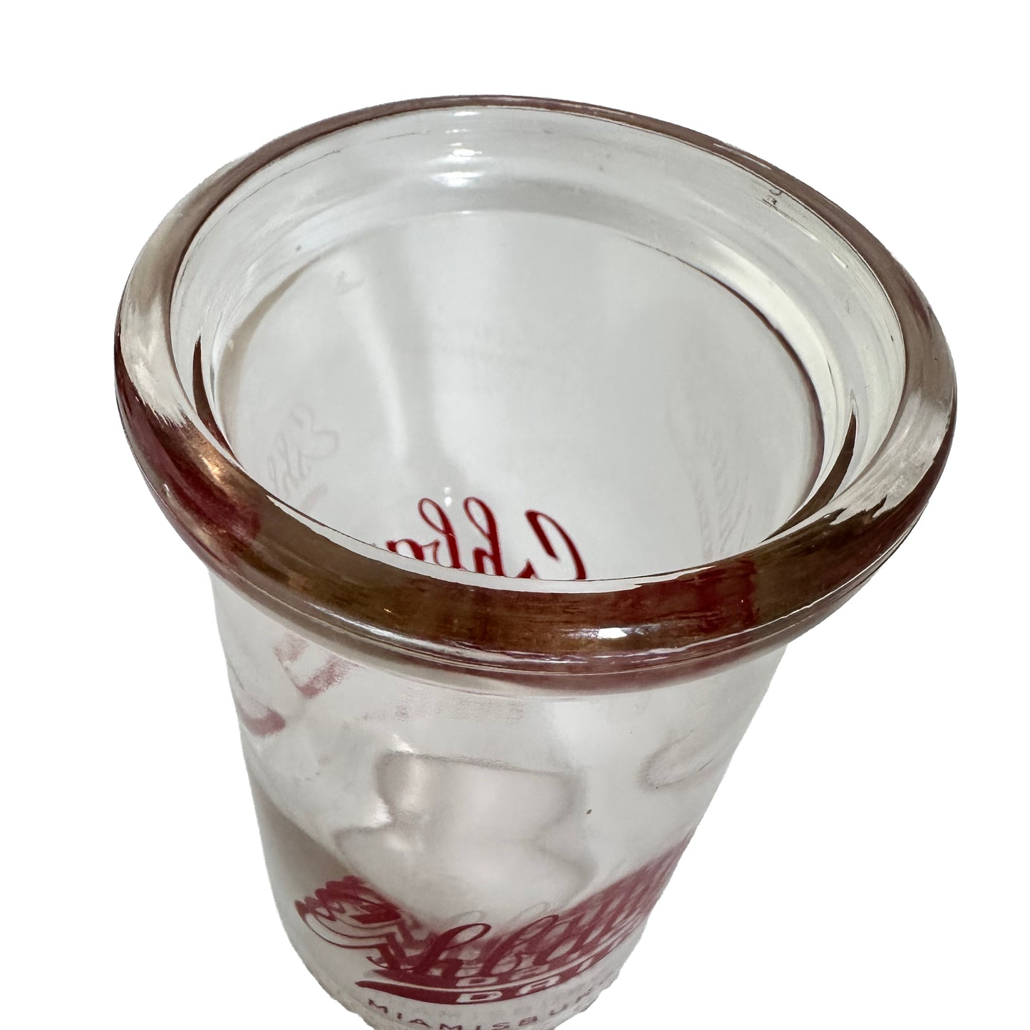1940s Eshbaugh's Dairy glass jar from Miamisburg, Ohio. Red advertising, 12 oz capacity, and excellent vintage condition.