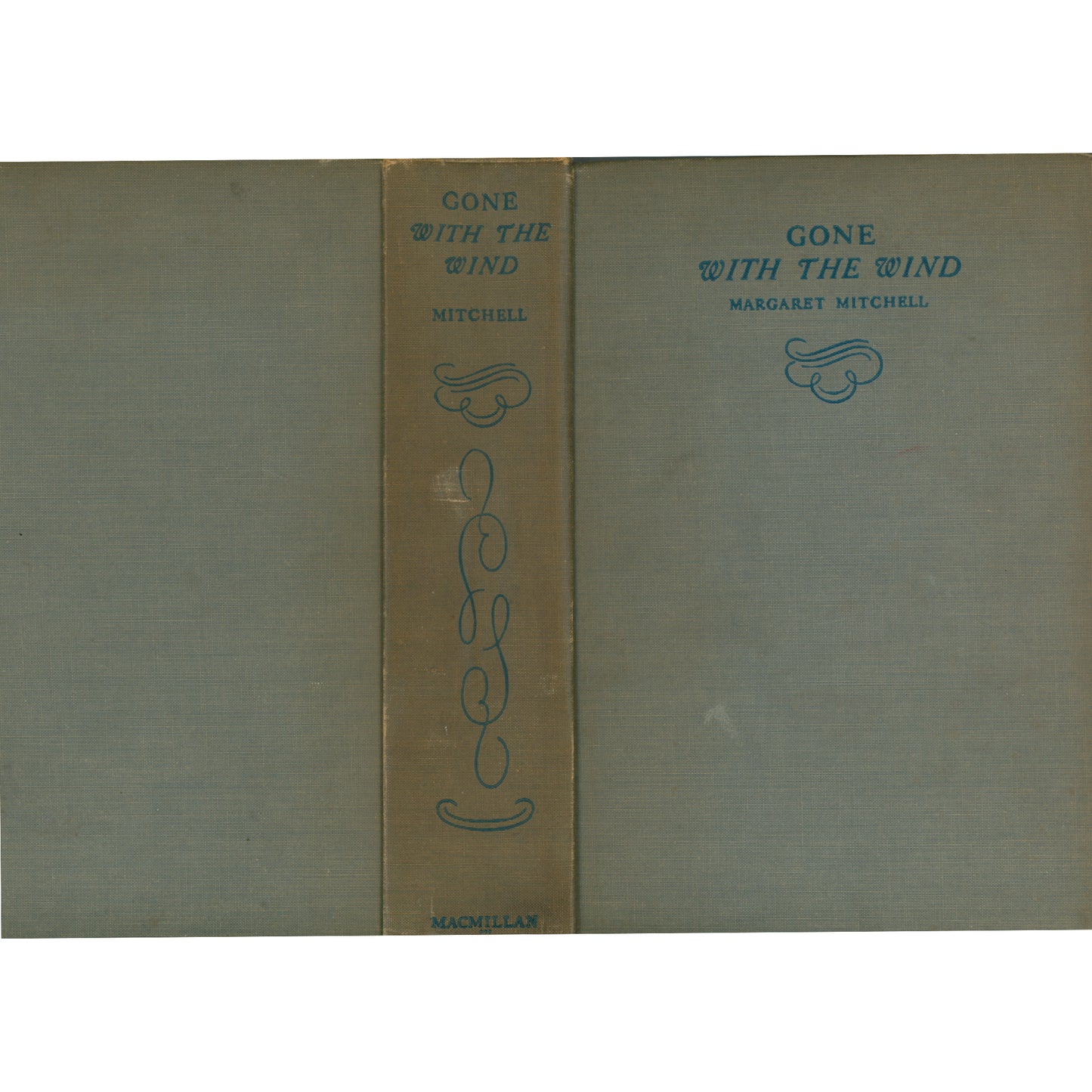 Early 1937 Macmillan printing of Gone With the Wind. Brown cloth binding, very good condition, with a 1937 Swedish inscription. A striking collectible classic. Spine with Back and Front Covers.