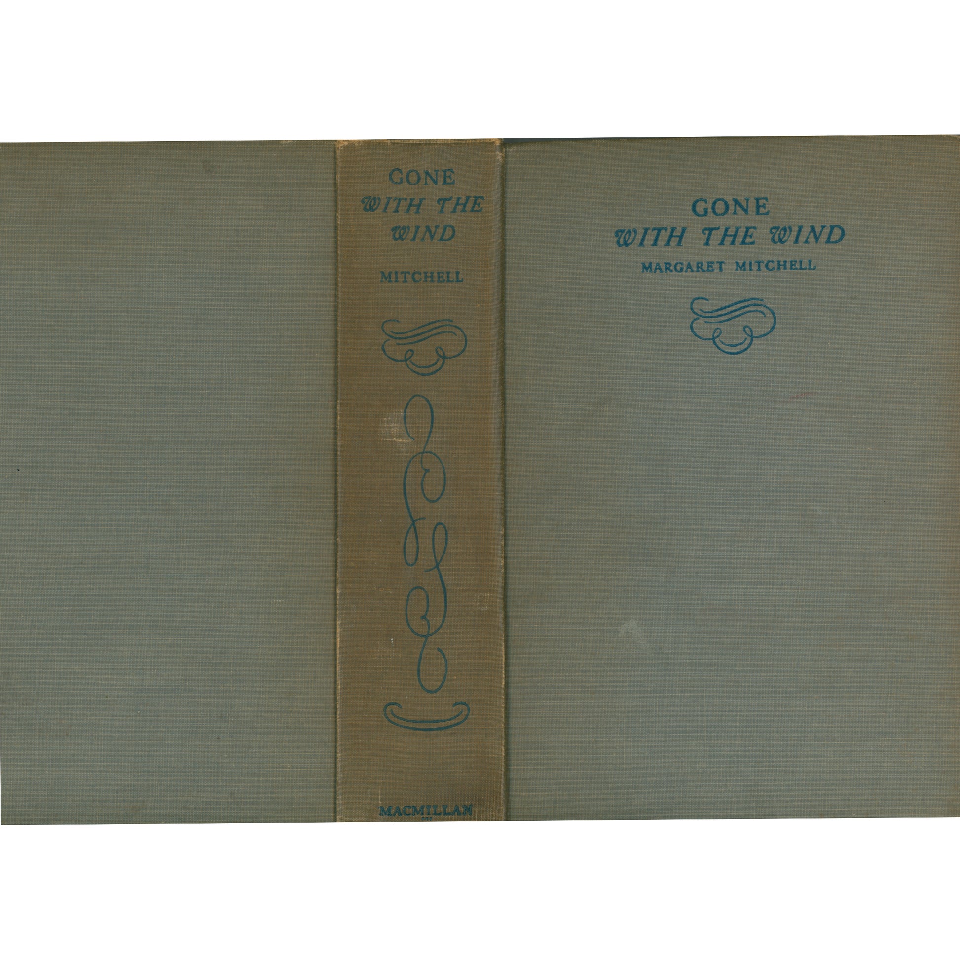 Early 1937 Macmillan printing of Gone With the Wind. Brown cloth binding, very good condition, with a 1937 Swedish inscription. A striking collectible classic. Spine with Back and Front Covers.