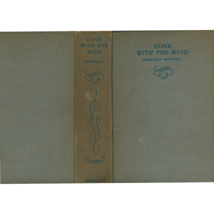 Early 1937 Macmillan printing of Gone With the Wind. Brown cloth binding, very good condition, with a 1937 Swedish inscription. A striking collectible classic. Spine with Back and Front Covers.