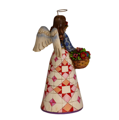 Jim Shore Heartwood Creek Smell The Flowers angel, 2007, item 4008943. Retired collectible with pink quilt skirt, floral basket, and original box. 4