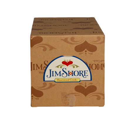 Jim Shore Heartwood Creek Smell The Flowers angel, 2007, item 4008943. Retired collectible with pink quilt skirt, floral basket, and original box.