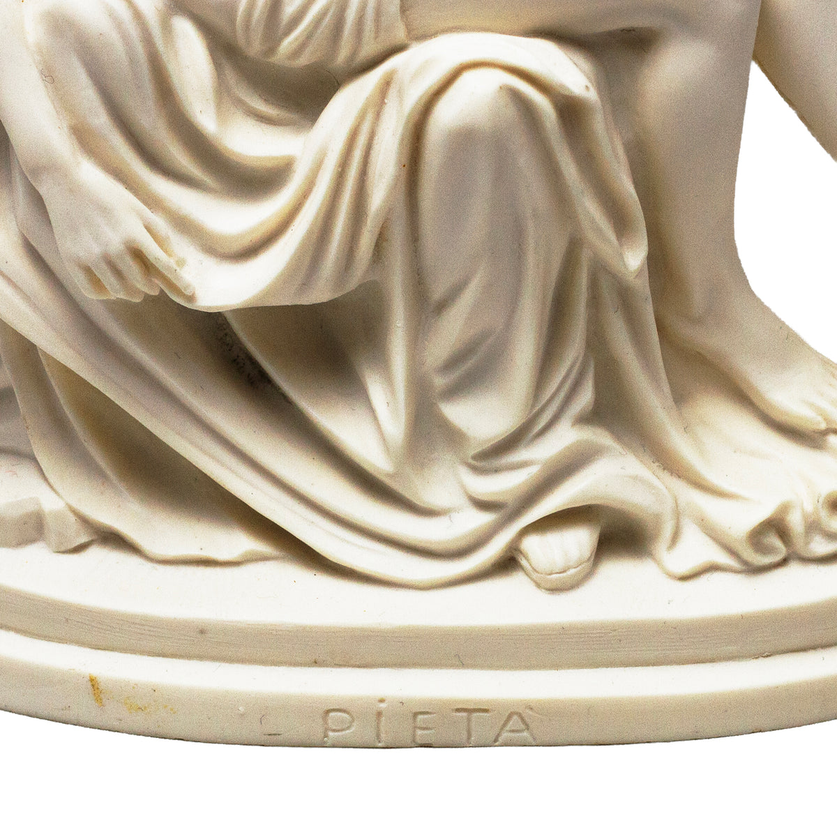 Ivory resin Pietà statue after Michelangelo. 7-inch religious sculpture with detailed drapery. Base