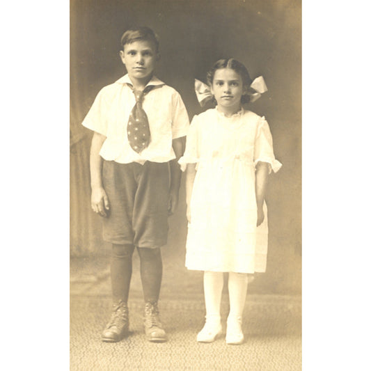 Antique 1920 real photo postcard of identified siblings Lawrence & Hazel McConnell, Indiana. AZO RPPC with handwritten family message.