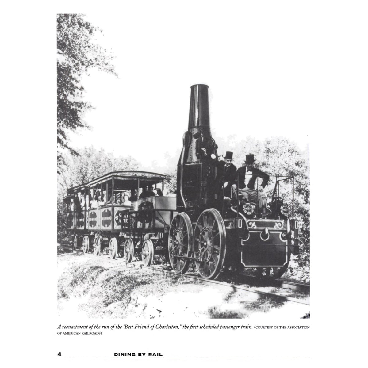 A black-and-white historical photograph of Best Friend of Charleston from Dining by Rail showing an early passenger train with people on board traveling through a wooded area.