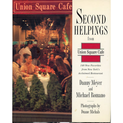 A book cover for 'Second Helpings from Union Square Cafe' by Danny Meyer and Michael Romano, featuring a restaurant interior photograph on the left and a cream-colored text panel on the right.