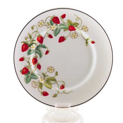 Vintage Avon Strawberry Porcelain collection (1978) dessert plates with gold trim.