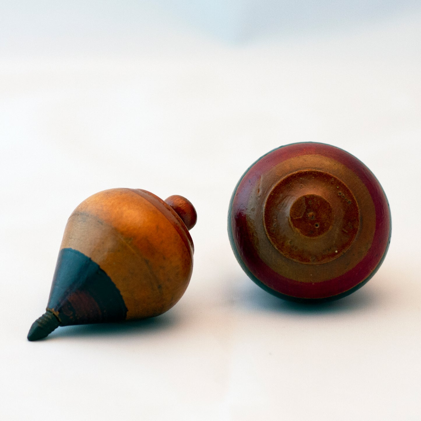 HAND PAINTED WOOD SPINNING TOPS Set of Two Circa 1930s to 1940s