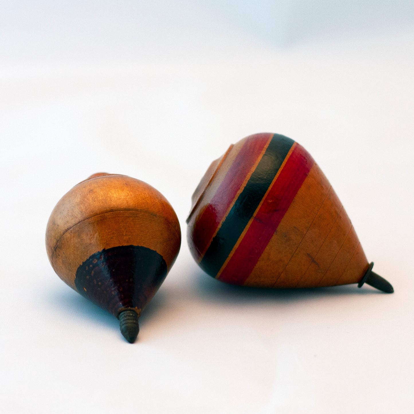 HAND PAINTED WOOD SPINNING TOPS Set of Two Circa 1930s to 1940s