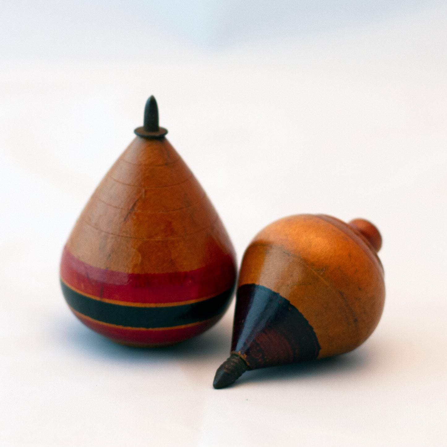 HAND PAINTED WOOD SPINNING TOPS Set of Two Circa 1930s to 1940s