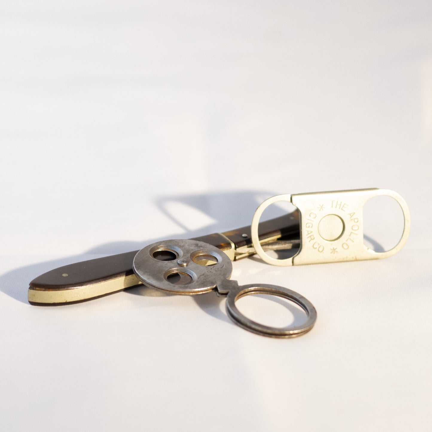 Three (3) VINTAGE CIGAR CUTTERS Includes SINGLE & TRIPLE BLADE GUILLOTINE & WOOD-TONE HANDLE V-CUT Apollo Cigar Co. Cincinnati and DRGM Germany Circa 1890 - 1950