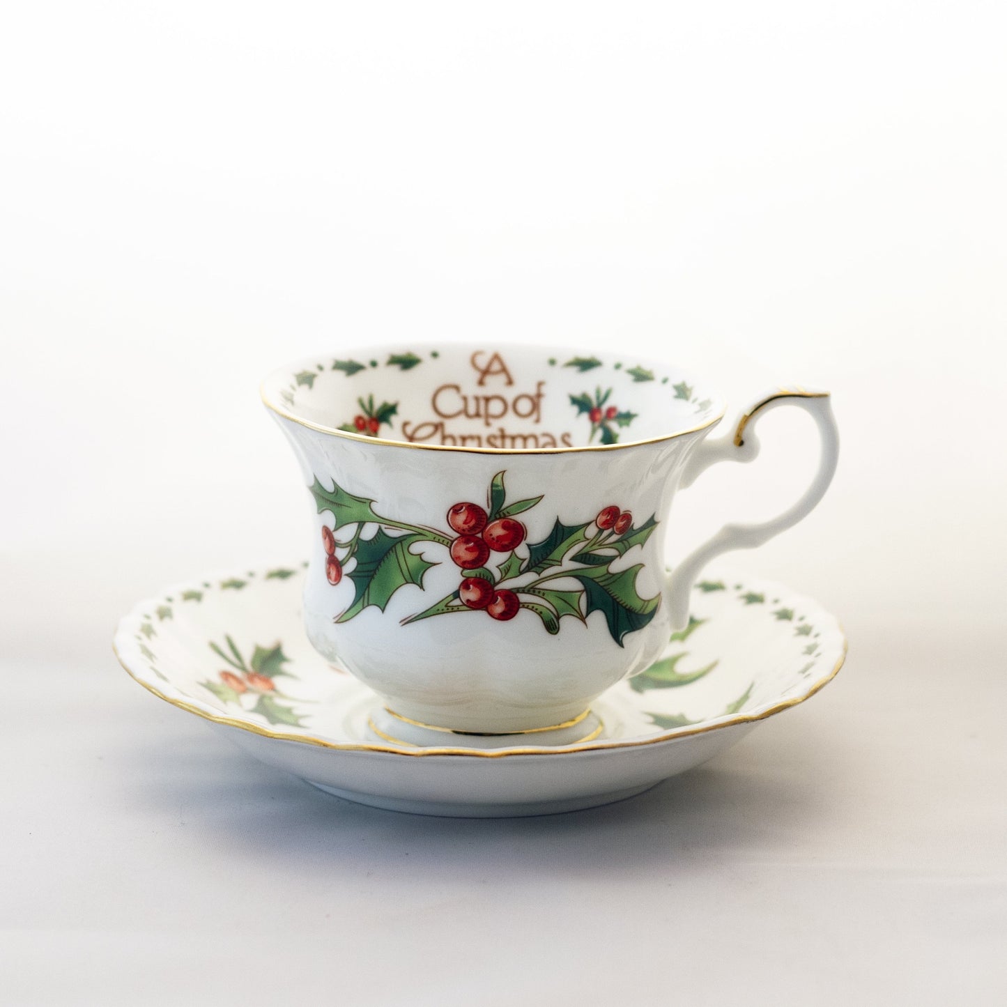Waldman House “A CUP OF CHRISTMAS TEA” Footed Teacup and Saucer with Matching Ornament Size Tom Hegg Book Circa 1992