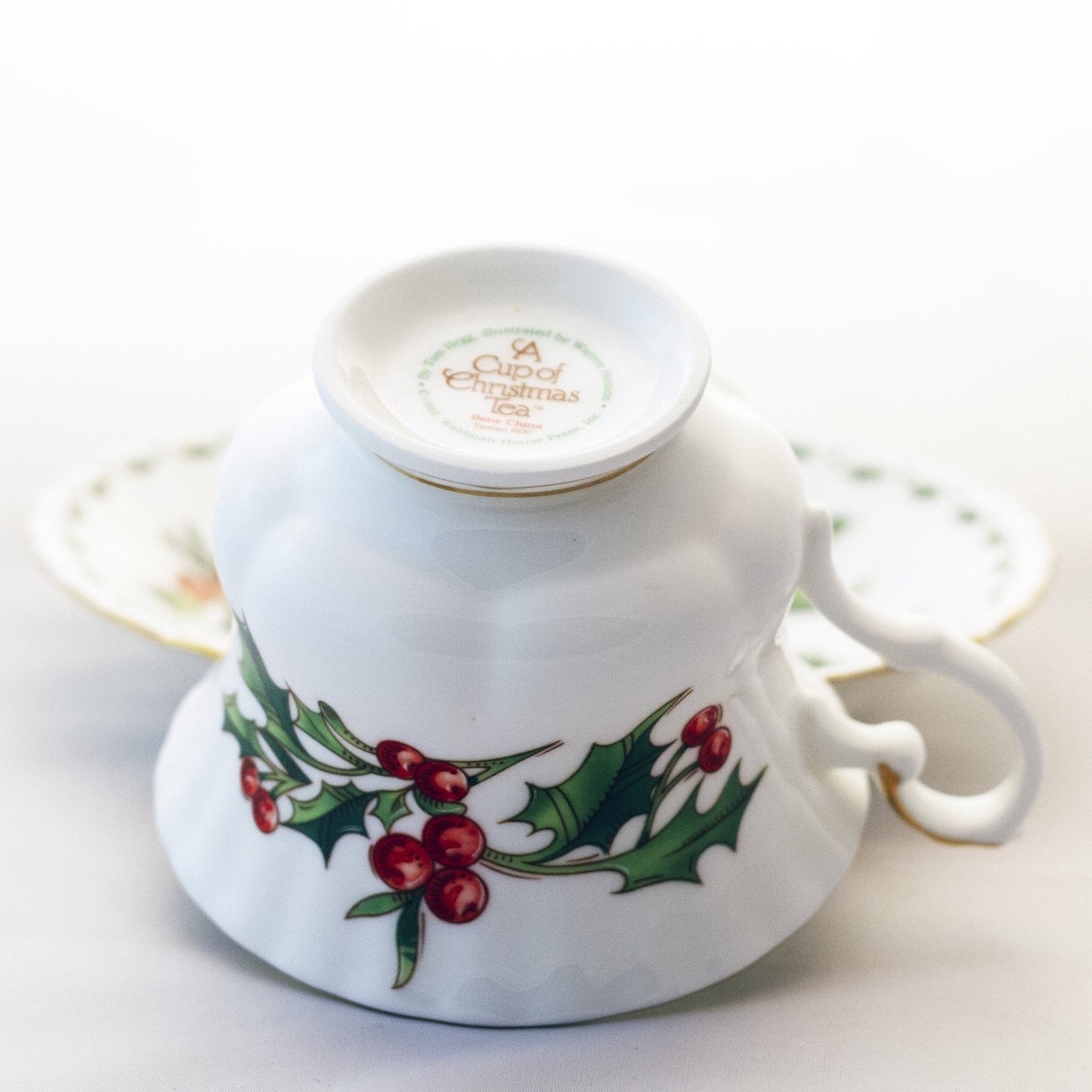 Waldman House “A CUP OF CHRISTMAS TEA” Footed Teacup and Saucer with Matching Ornament Size Tom Hegg Book Circa 1992