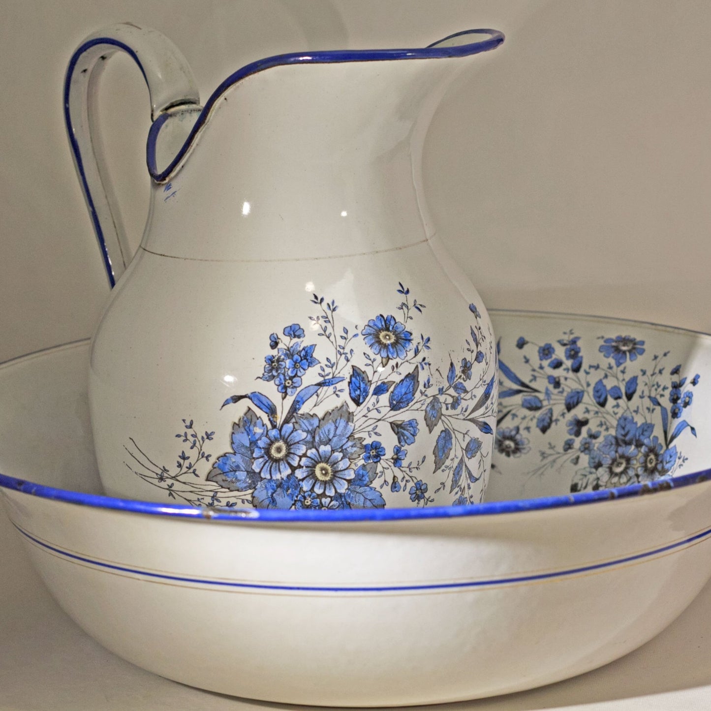 ENAMEL WARE DECORATED BOWL AND PITCHER SET by Gebrüder Baumann Circa 1885 Marked with Rampant Lion Holding Tankard with B