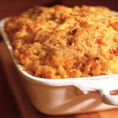 Williams‑Sonoma: American (2004) features 40+ classic American recipes with stunning full‑color photography. First printing, like‑new hardcover with dust jacket. Macaroni and Cheese