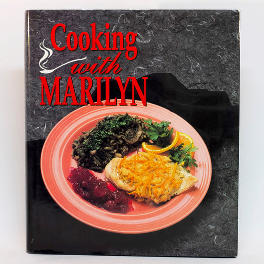 COOKING WITH MARILYN is a collection of recipes for "real" food with an emphasis on simplicity. Along with the recipes and menu suggestions, the book is sprinkled with valuable food tips and food presentation. The cookbook is in like-new condition with dust jacket intact. ISBN-10: 156554075; ISBN-13: 978-1565540750 