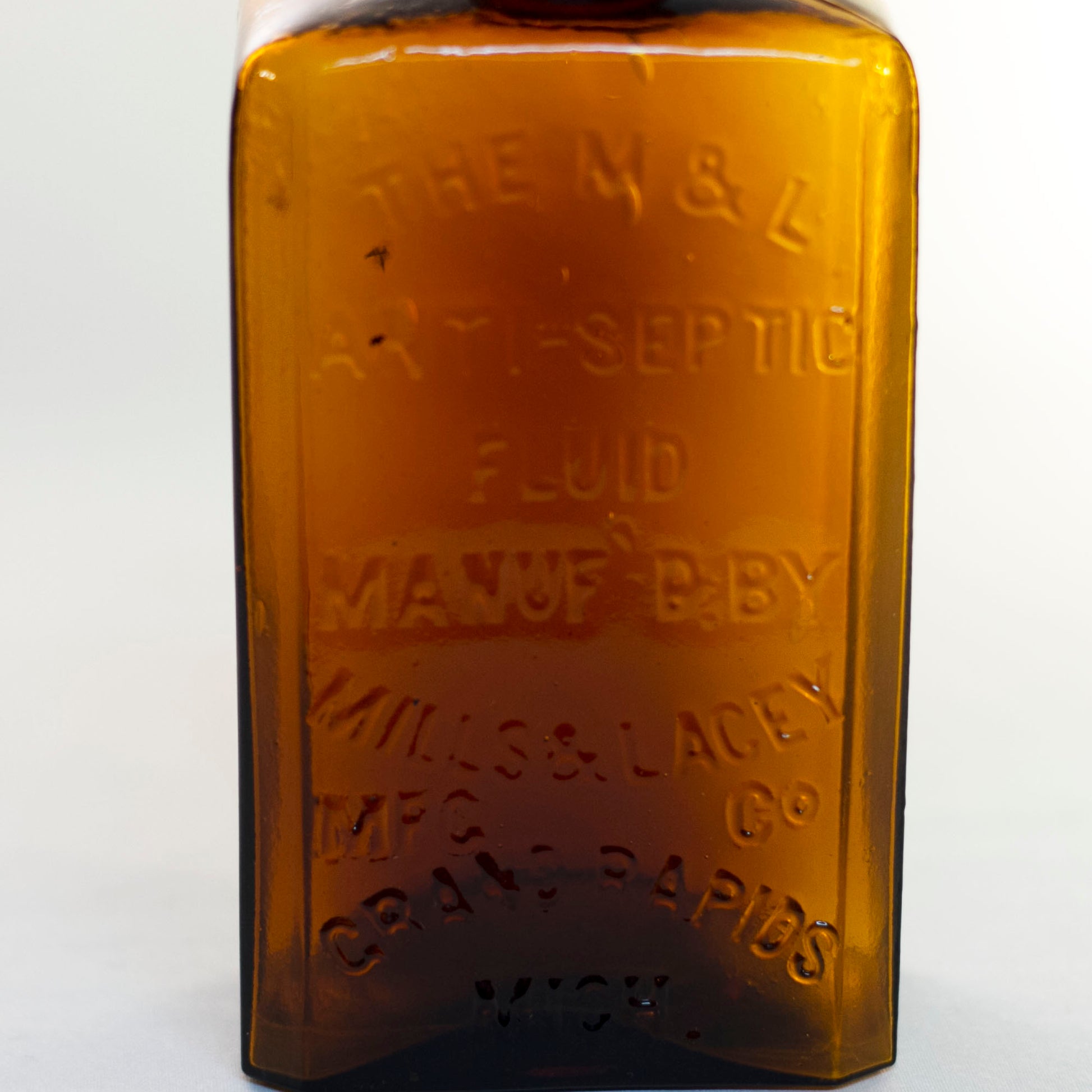 Antique Amber Glass M & L ANTI-SEPTIC Fluid Bottle for Embalming by Mills & Lacey Circa 1880s