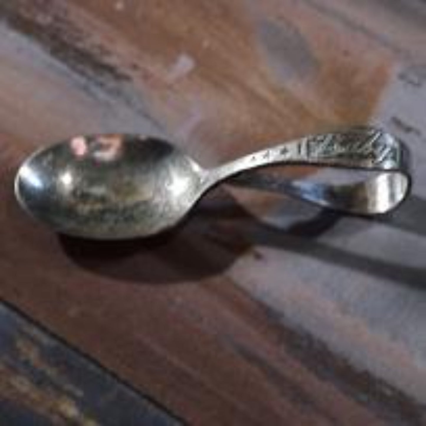 ONEIDA SILVER PLATE CURVED HANDLE BABY SPOON by Oneida Community