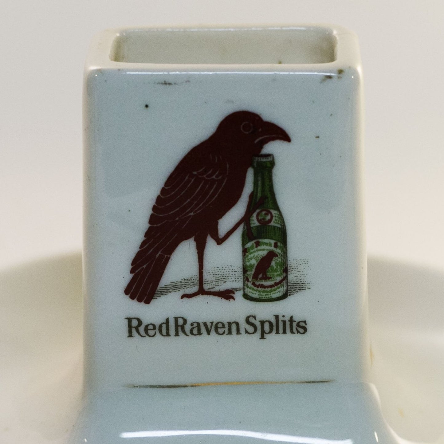 RED RAVEN SPLITS "ASK THE MAN" Porcelain Advertising Double- Logo Match Holder Circa Early 1900s