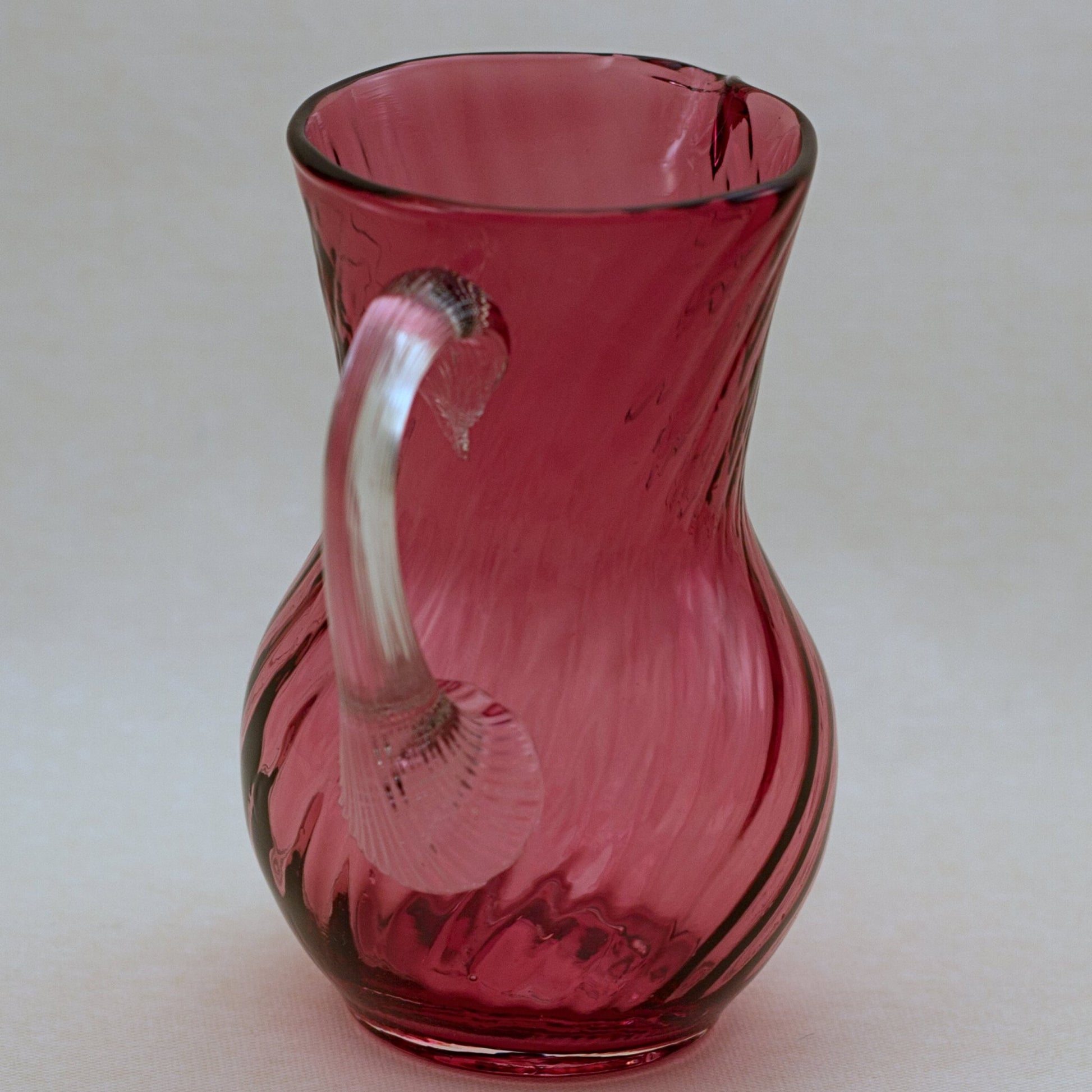 PILGRIM CRANBERRY GLASS Jug or Pitcher with Optic Swirl and Applied Clear Handle