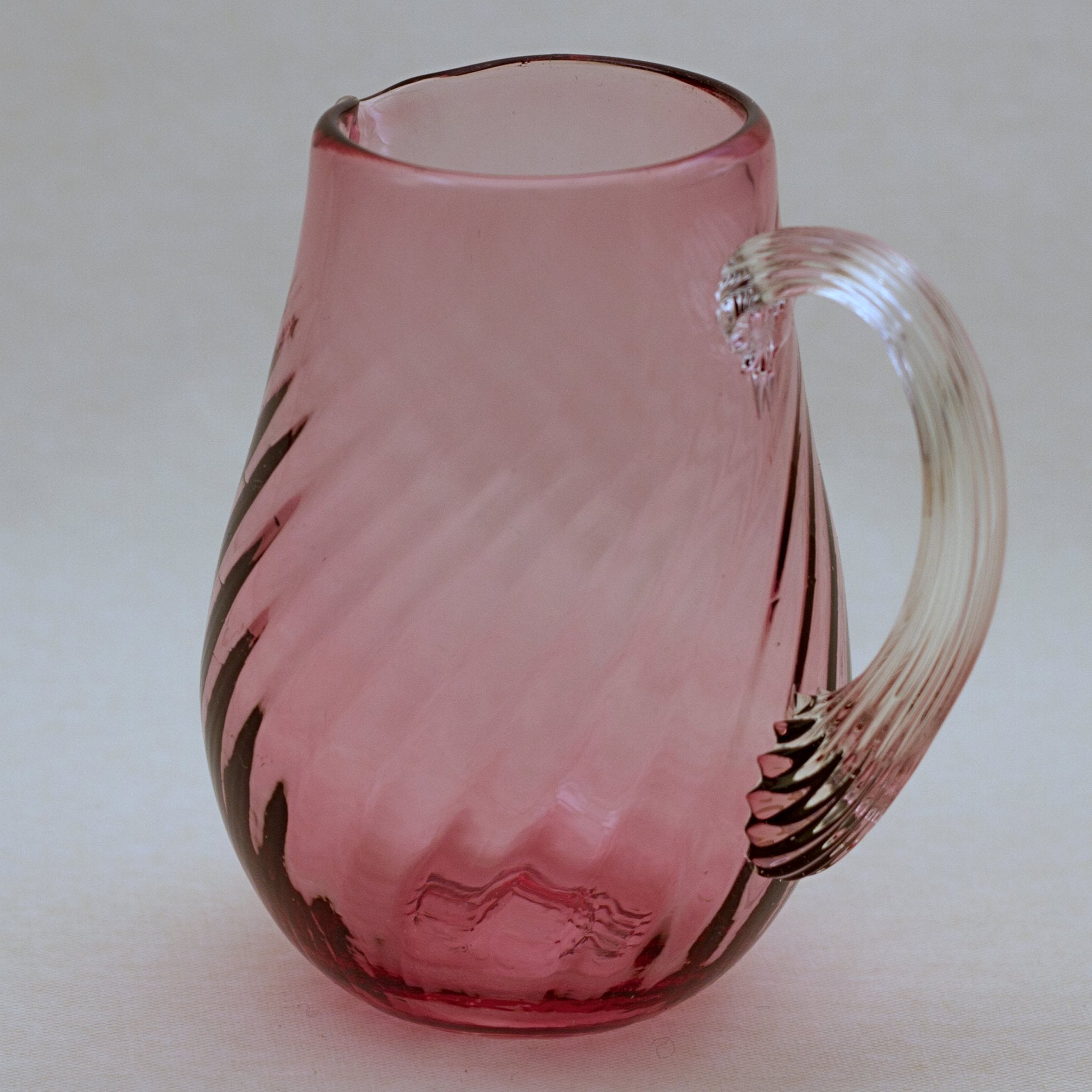 Vintage deals glass pitcher pink and black