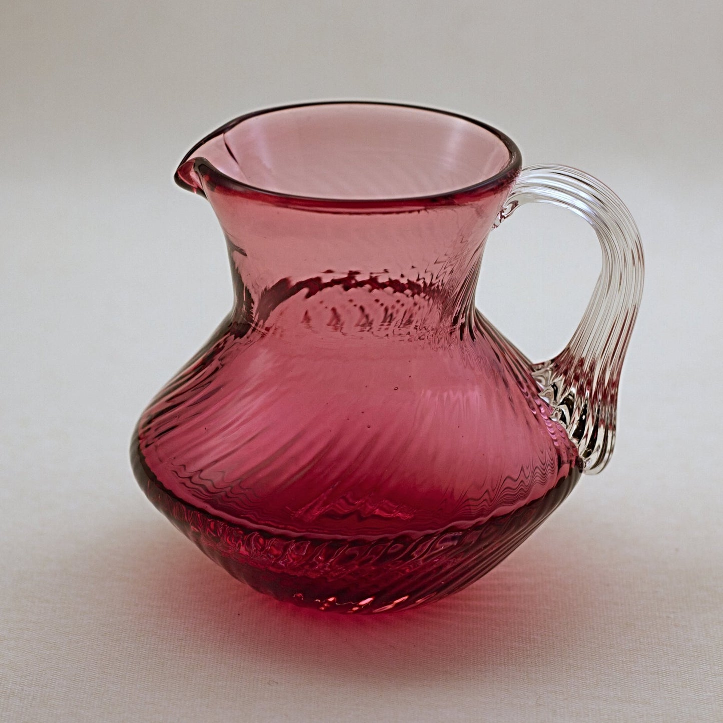 FENTON CRANBERRY GLASS Pitcher with Embossed Fern Design and Reed Design Handle