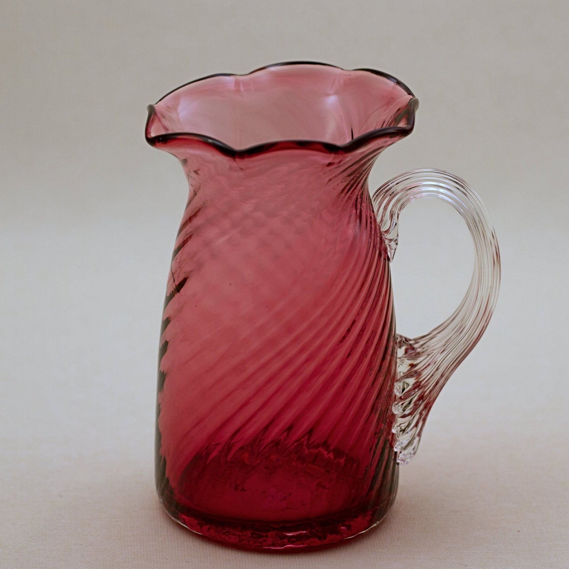 PILGRIM CRANBERRY GLASS Ruffled Rim Pitcher with Optic Swirl