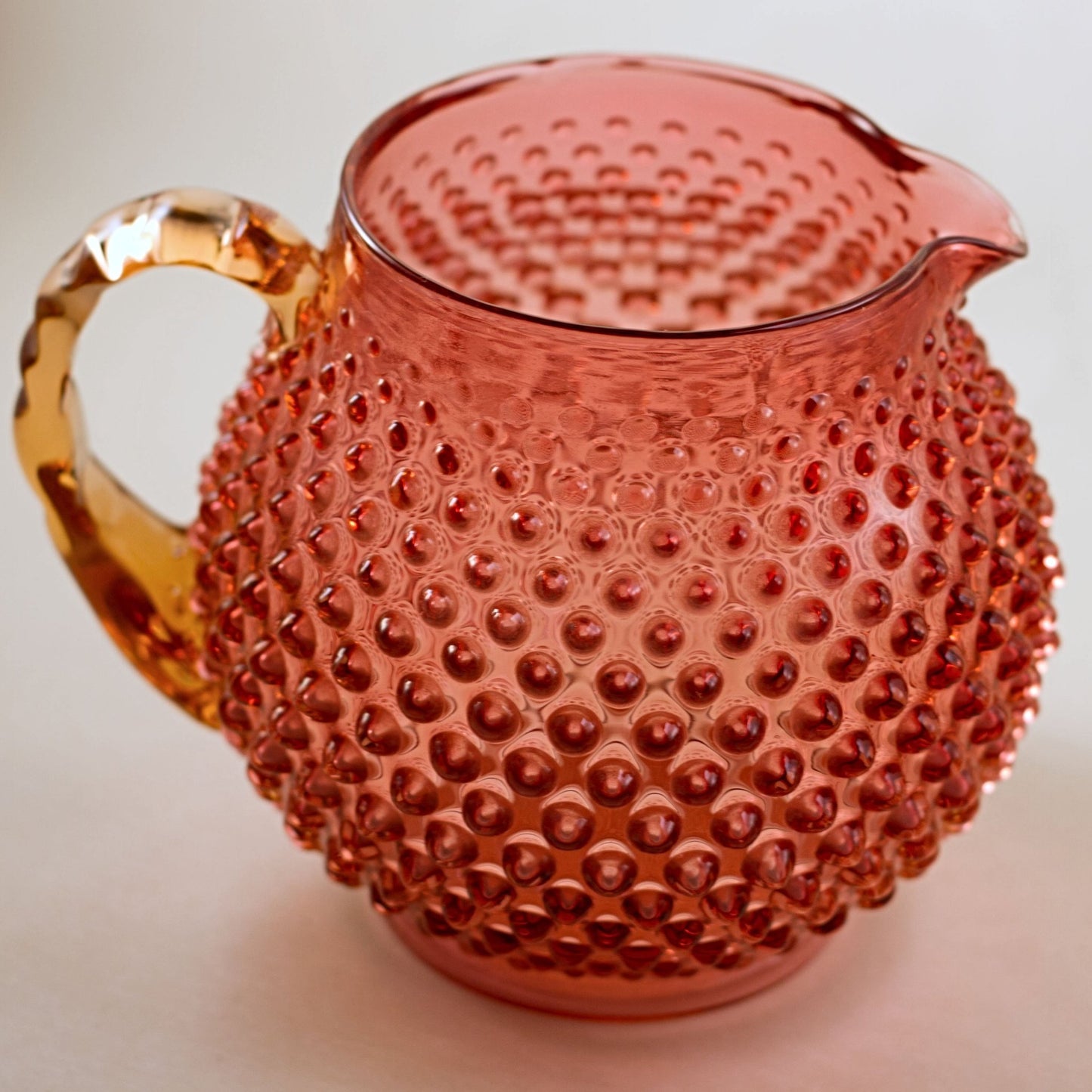 FENTON CRANBERRY GLASS Hobnail Squat Jug with Amberina Crimped Handle Circa 1940s